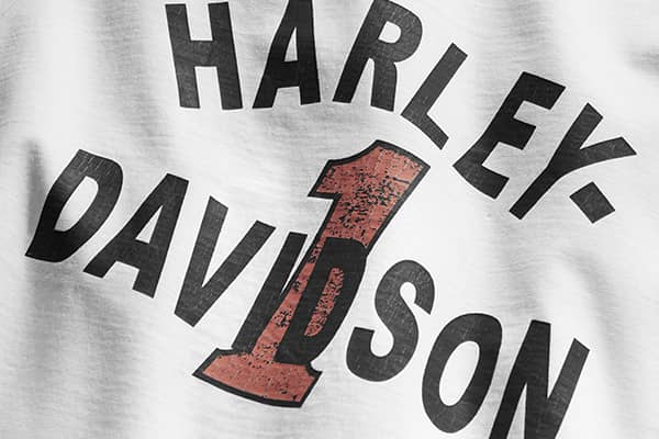 Closeup of a white Harley-Davidson T-shirt from their Performance Sportswear line.